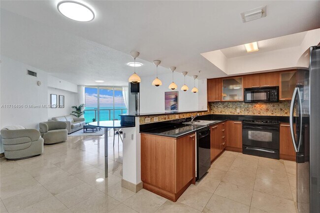 Building Photo - 16699 Collins Ave