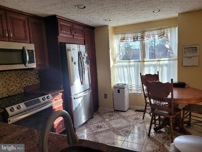 Building Photo - 14253 Ballinger Terrace