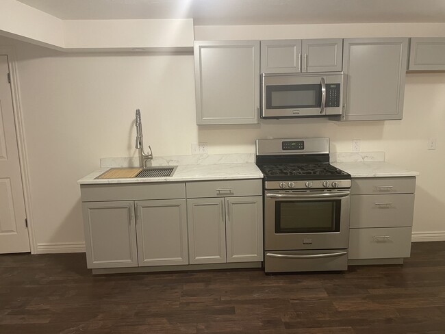 Brand new kitchen with stainless steel sink and appliances - 853 W 2300 S