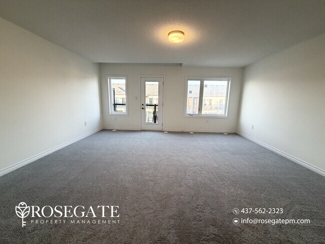 Photo du bâtiment - Spacious 3-Floor Freehold Townhome with Garage, Private Balcony & Backyard – Brampton