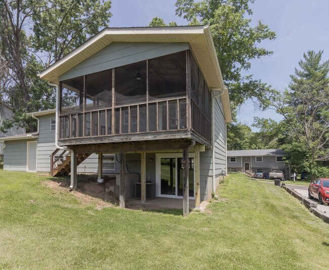 Building Photo - Charming 3BR Home-Screened Porch, Private Garage & Massive Backyard