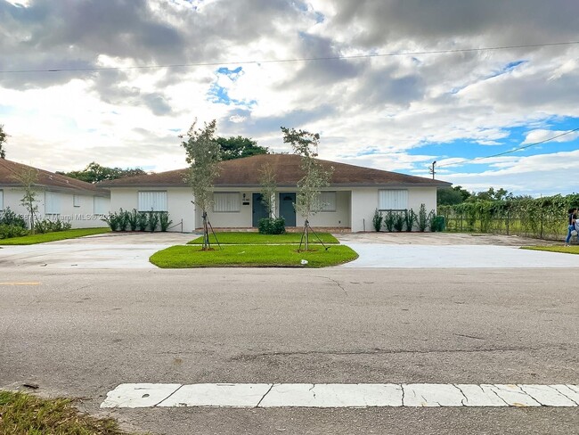 Building Photo - 10380 NW 10th Ave