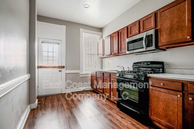 Building Photo - 717 W Lanvale St
