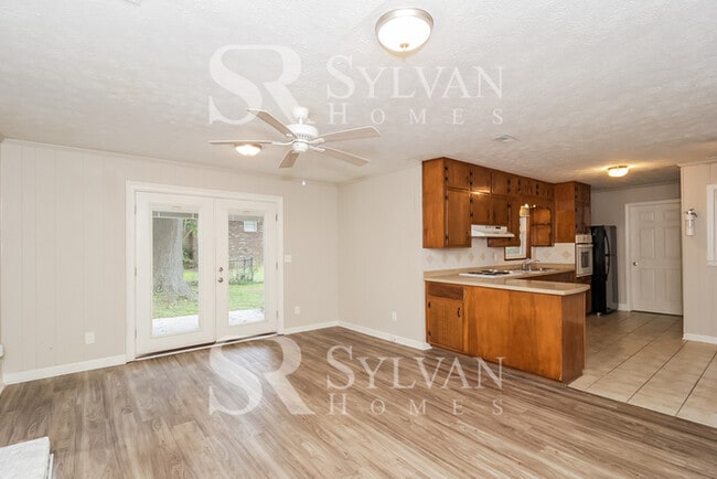 Building Photo - Turn the key. Enter. Smile. Repeat every day!