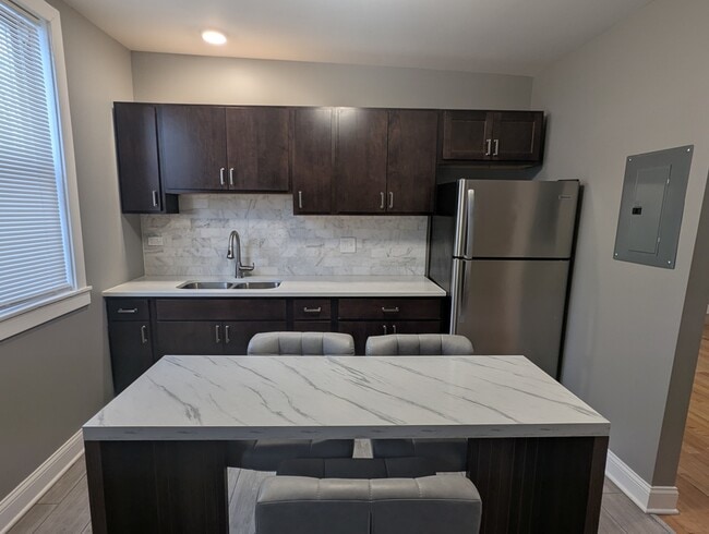 Building Photo - 11005 S Perry Ave