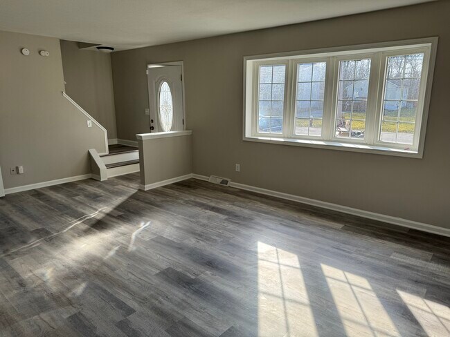 Plenty of natural light in this large living room with that connects to the dining room - 32953 Alva Dr