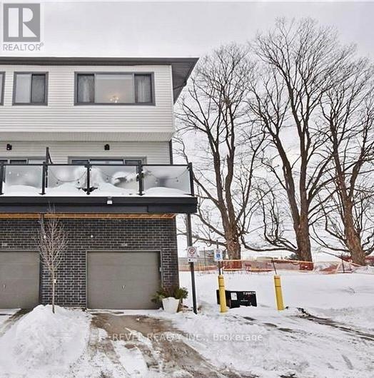 Photo du bâtiment - 369-369 Essa Rd