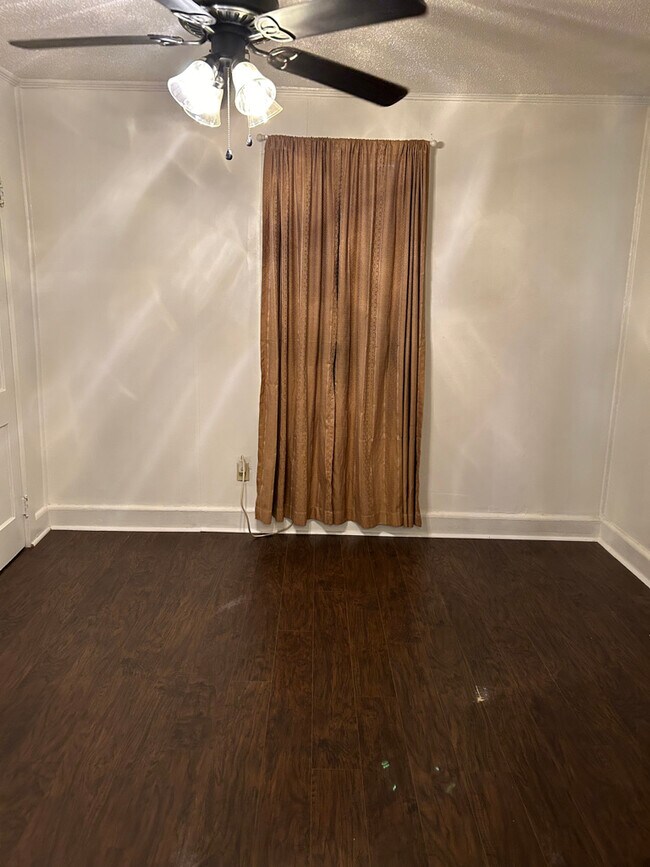 Back bedroom viewed from kitchen - 131 N Pike W