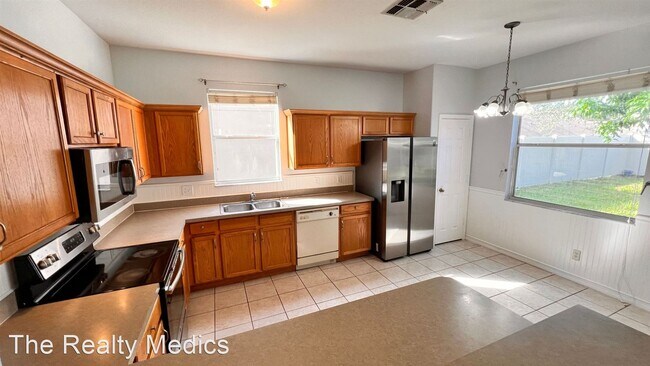 Foto del edificio - 5 br, 3 bath House - 13628 Tetherline Trl