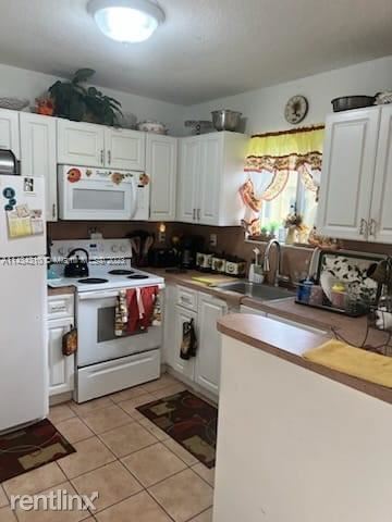 Foto del edificio - 3 br, 2 bath House - 970 NE 34th Ave Unit 101
