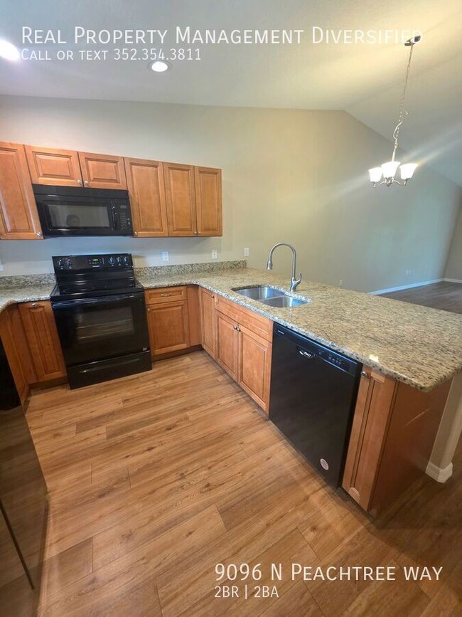 Building Photo - 9096 N Peachtree Way