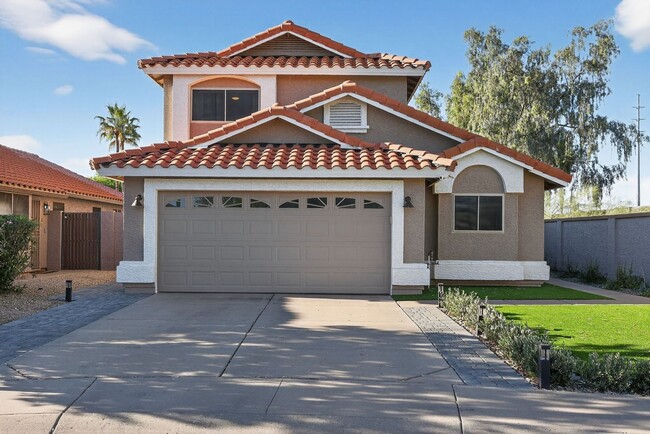 Building Photo - 8807 E Dahlia Dr