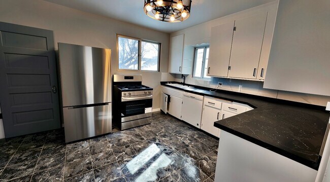 Building Photo - Charming Newly Renovated 3-Bedroom Rental with Garage & Basement