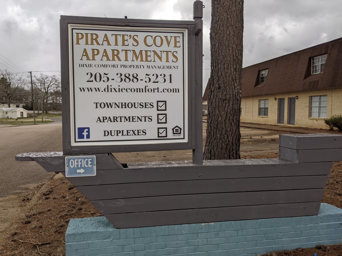 Primary Photo - Pirate Cove Apartments 9-16