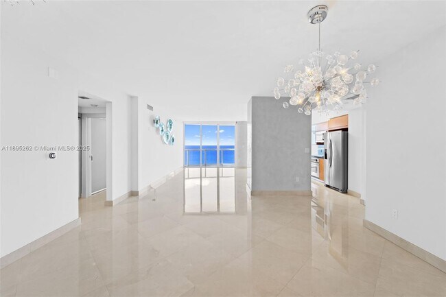 Building Photo - 6365 Collins Ave
