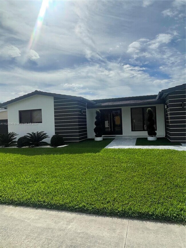 Building Photo - 9280 SW 54th Pl