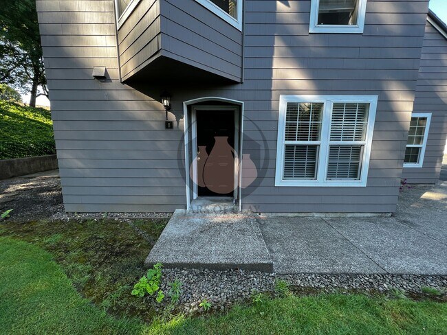 Building Photo - Adorable Ground Level Charbonneau Condo - ...