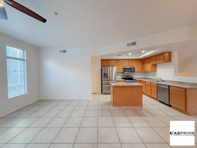 Building Photo - Elevate Your Lifestyle In This Stunning 2/2.5, Three-Story Home Nestled Inside The Prestigious, Gate