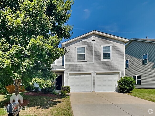 Building Photo - 6215 Woodland Commons Dr