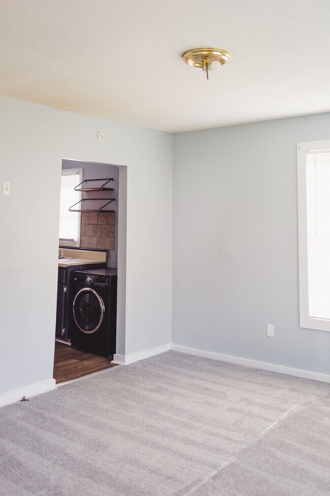 Living room into kitchen - 2902 8th Ave SW