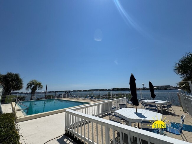 Building Photo - Waterfront 1-Bedroom Condo in FWB – Stunning Sound Views, Minutes from Bases & Beaches!