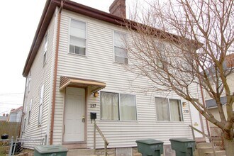 Building Photo - 135-137-137 E 4th Ave