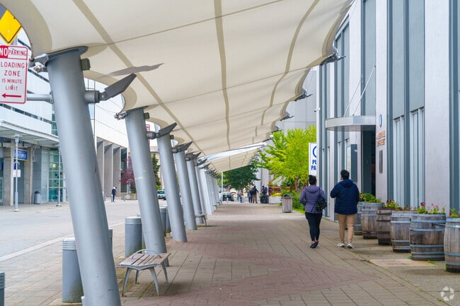 Residents enjoy urban design and walkable sidewalks in downtown Anchorage.