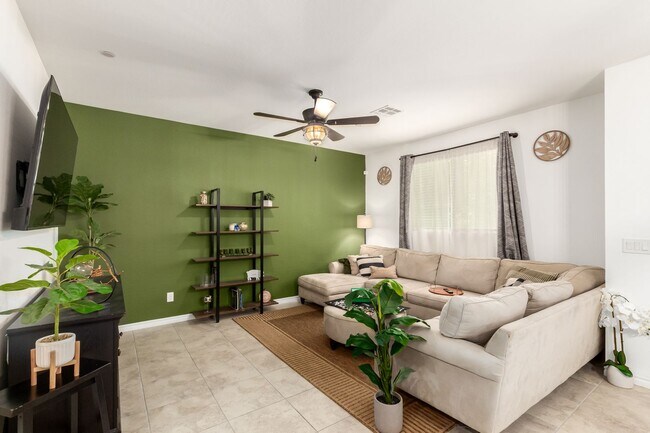 Building Photo - Beautiful corner lot townhome with custom paint, plentiful community green spaces.