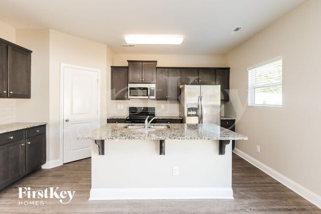 Building Photo - 9014 Evans Woods Dr