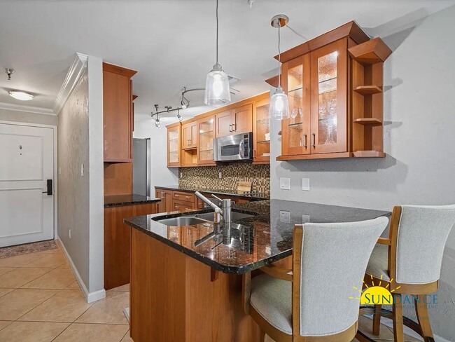 Building Photo - Furnished Optional 2 Bedroom Home, Holiday Isle Waterfront Condo!