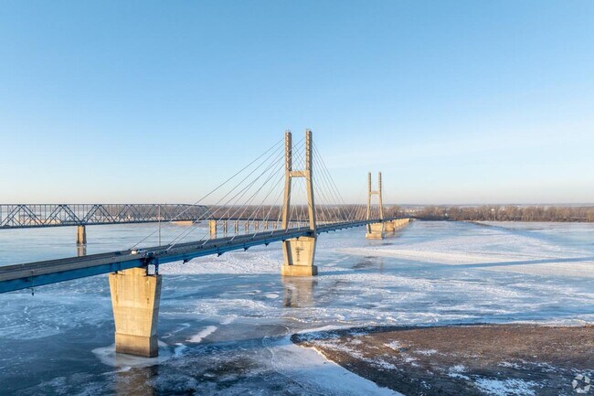 Pass over the Quincy Bayview Bridge to get into town.