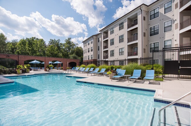 Outdoor Resort-Style Pool, Hot Tub, and Sundeck - The Cosmopolitan at Lorton Station