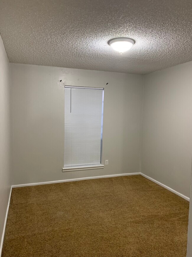 Foto del edificio - WoodCreek Apartments