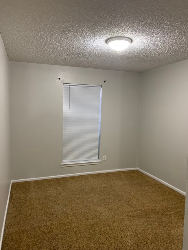 Building Photo - WoodCreek Apartments