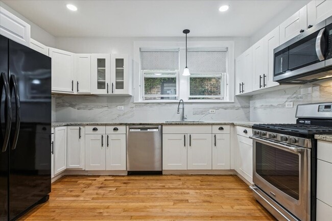 Building Photo - 6724 N Campbell Ave