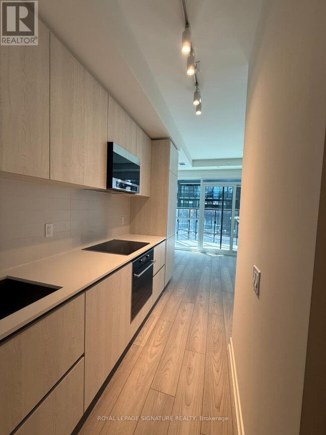 Photo du bâtiment - 110 Broadway Ave