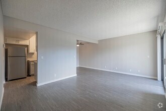 3BR, 2BA - 1,112 SF - Living Room - The Mews at Dixon Farm