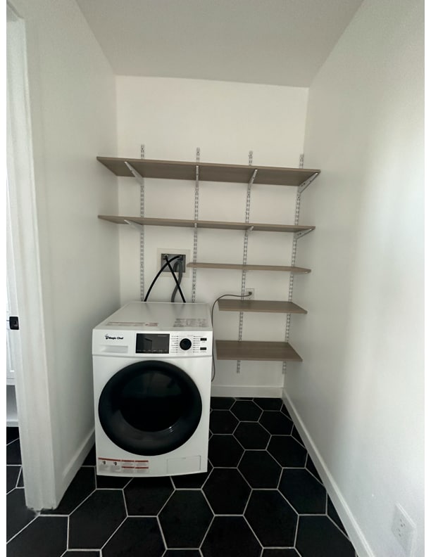 All-in-one washer and dryer with shelves. Can put curtain in front. - 2148 Felspar St