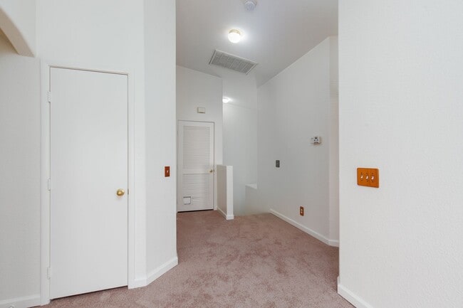 Building Photo - Two bedroom townhome with garage in gated ...