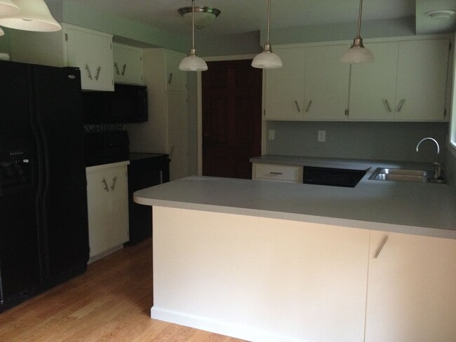 Building Photo - Newly painted, wonderful home w wood floor...