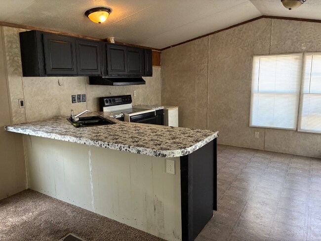 Foto del edificio - 2710 N Farm Rd 137
