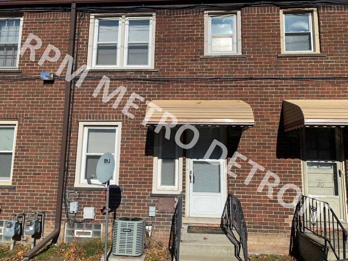 Primary Photo - Ready to be Moved in Brick Condo in Dearborn.