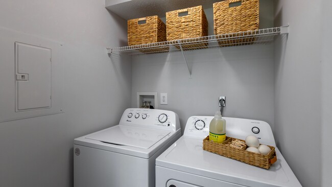 Experience the convenience of an in-unit laundry room, equipped with a full-size washer and dryer. Say goodbye to laundromat trips and enjoy the ease of doing laundry in the comfort of your own home. - ONYX