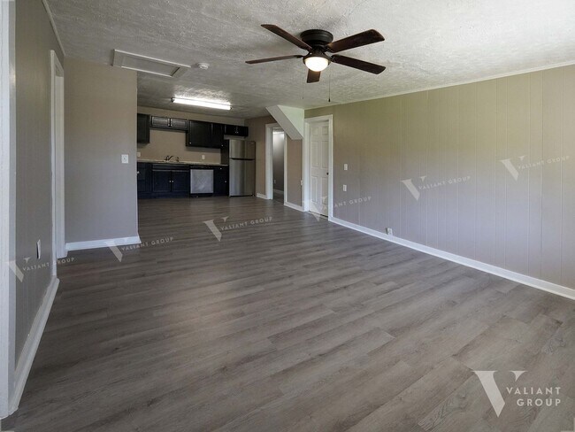 Building Photo - Charming Three-Bedroom, Two-Bathroom Stone...