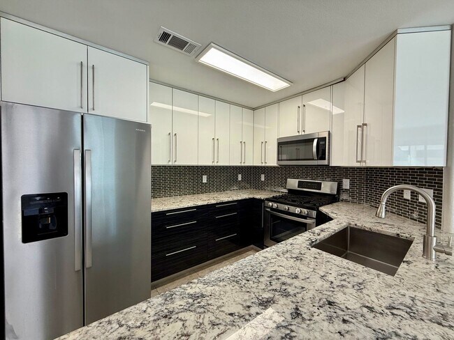 Building Photo - $500 MOVE IN BONUS - STUNNING UPDATED 5 BE...