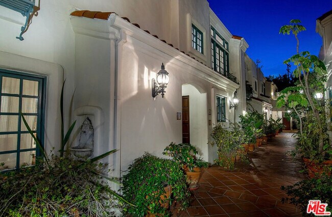 Entry Courtyard Evening - 1123 N Flores St