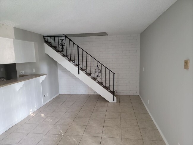 Building Photo - NICELY UPGRADED 2 STORY TOWNHOUSE WITH GAR...