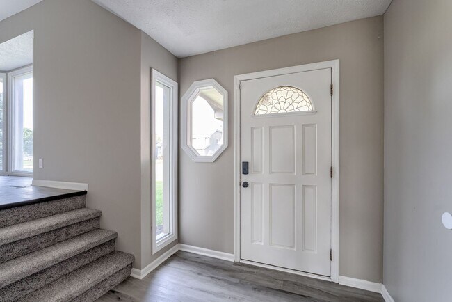 Building Photo - Fresh Updates & Prime Location Near Zorins...