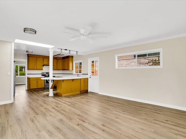 From back room looking past kitchen into front room - 12626 Greene Ave