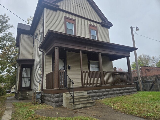 Photo - "5-Bedrooms with 2 Full Baths on Olive Street with 1676 sq feet!" Apartment